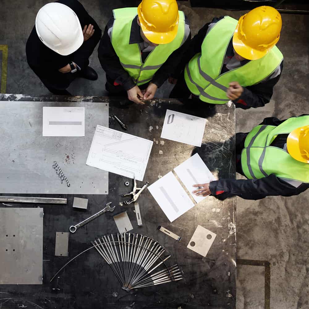 workers collaborating on facility design